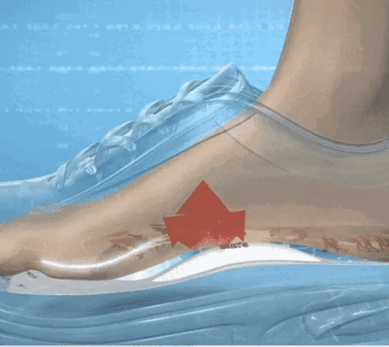Animated cutaway view of a foot inside a translucent shoe, with a red arrow pointing upward at the contoured area beneath the arch.